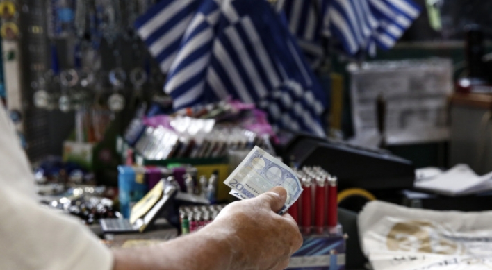 Greek bailout moves ahead after Germany gives its backing