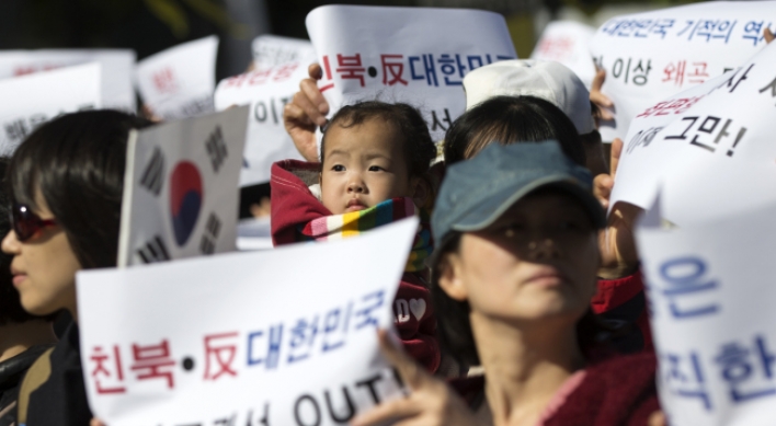 Ruling party links state textbook opponents to North Korea