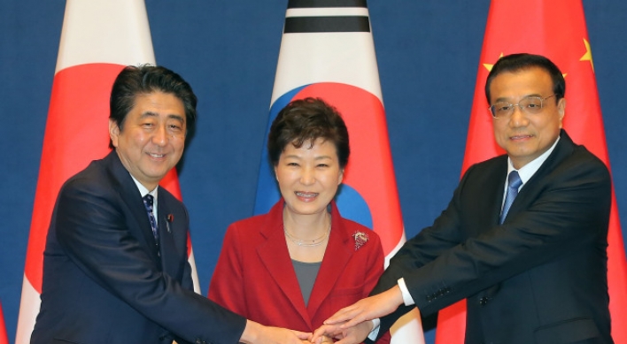 Trilateral summit spurs cooperation momentum