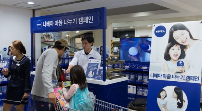 Nivea holds tin can cream photo engraving events