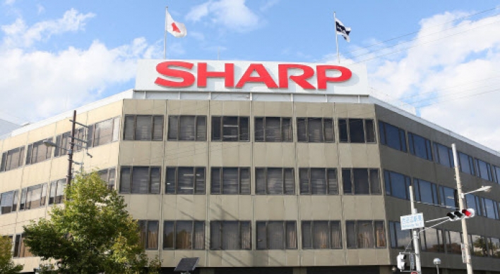 Sharp shares plunge as takeover thrown into question