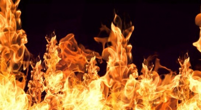 Woman attempts suicide by arson