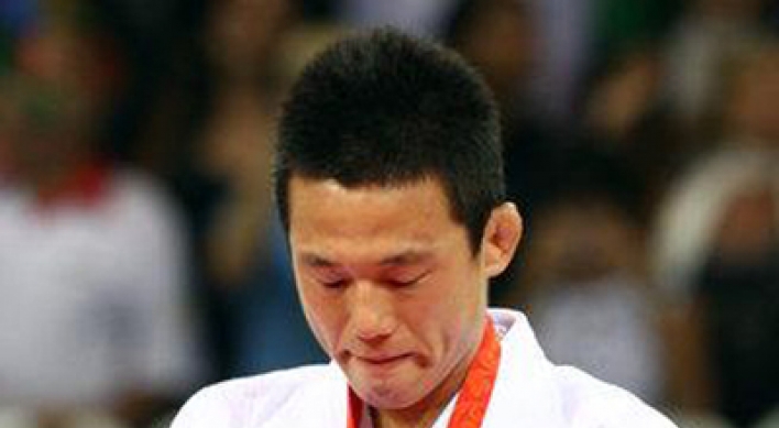 Former world judo champ Wang Ki-chun to retire