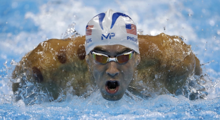 [Newsmaker] Phelps bids for astonishing 20th gold