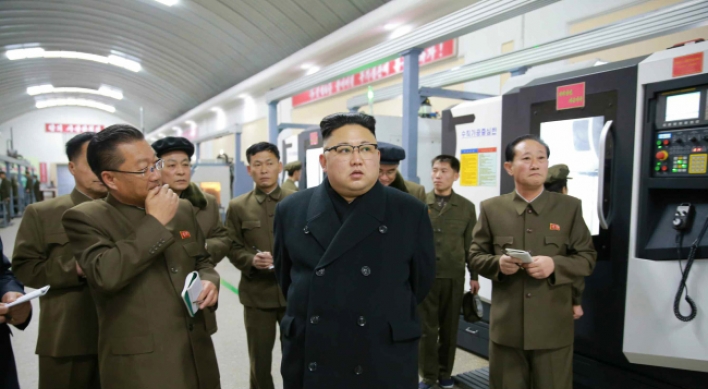 NK leader inspects precision machine plant