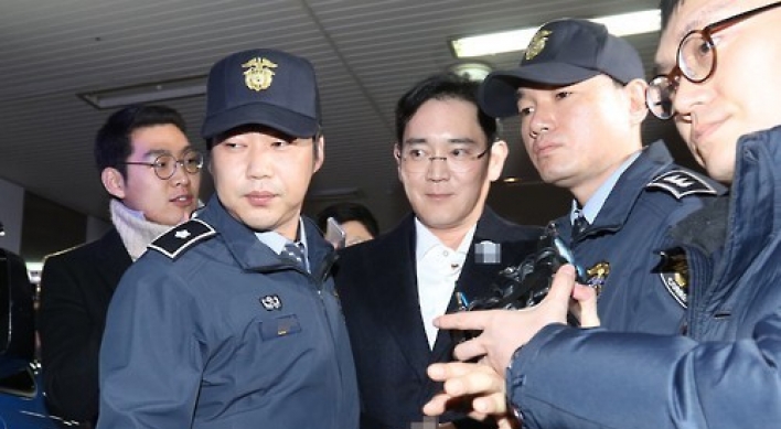 Samsung family’s stock value plunges on heir’s arrest