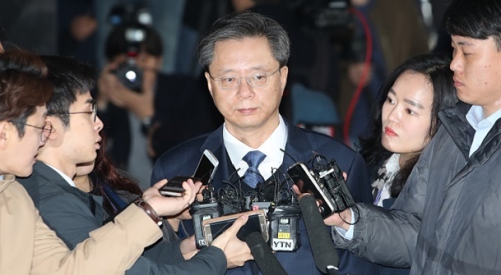 Woo questioned over corruption scandal