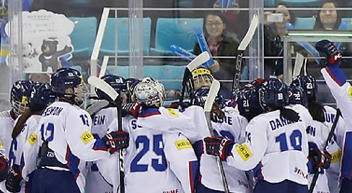 S. Korea hockey coach 'relieved' to be done with NK at worlds