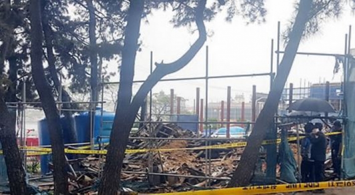 2 firefighters killed as burning pavilion collapses
