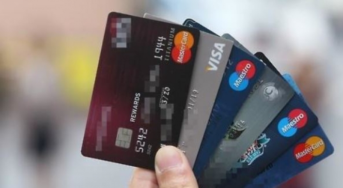 Card loans swing to upturn in Q3