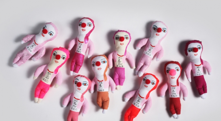 Artist ‘instantly sews’ thoughts, feelings into rag dolls