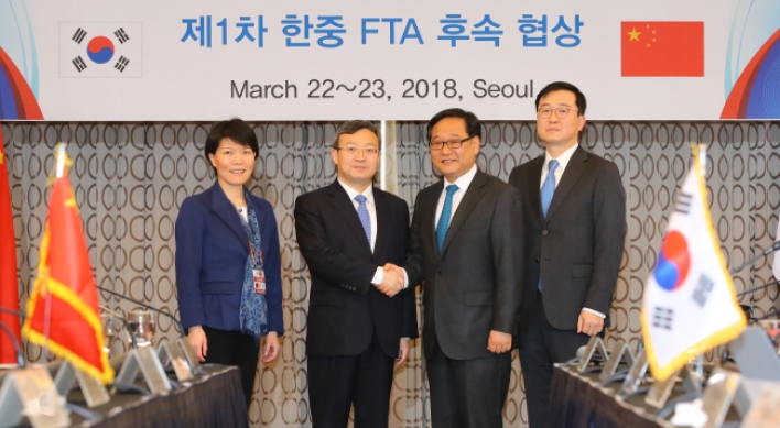 Korea, China begin follow-up FTA talks on services, investment