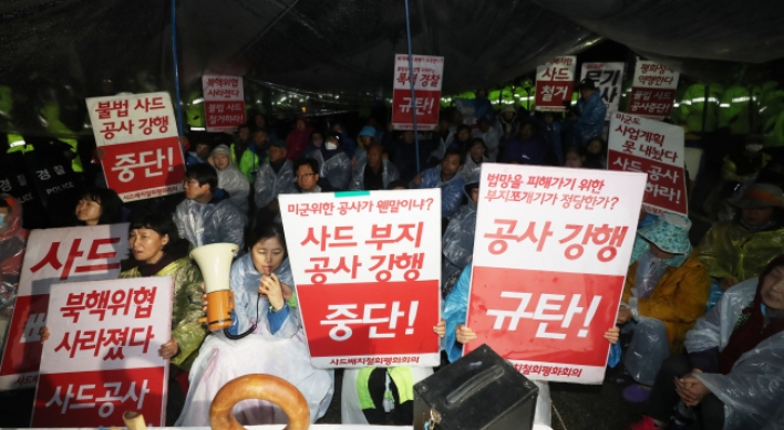 Residents confront police over THAAD base