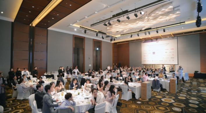 CEOs serve tables for AmCham charity night