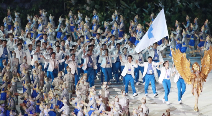 Koreas march together at Asian Games' opening ceremony