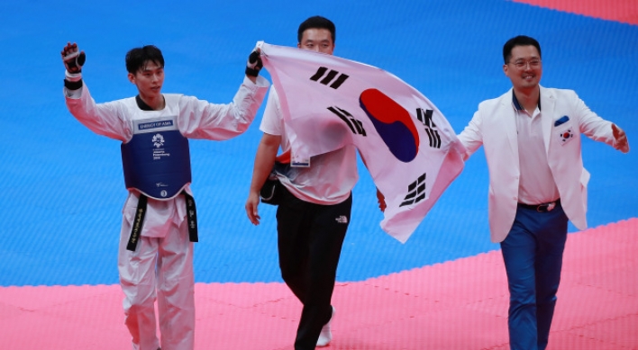 S. Korean taekwondo fighter Kim Tae-hun wins gold in men's 58kg