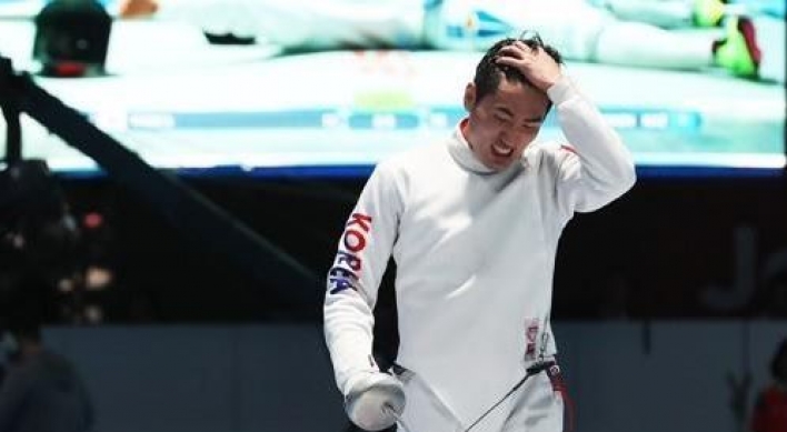 Ex-Olympic champ fencers chase team gold after losing individual titles