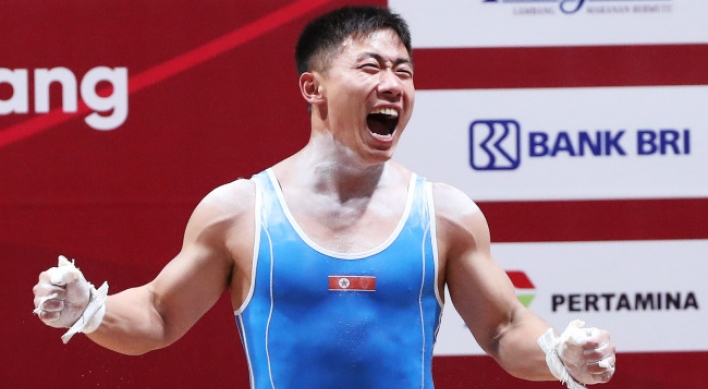 North Korea's O Kang-chol wins gold in men's 69kg weightlifting