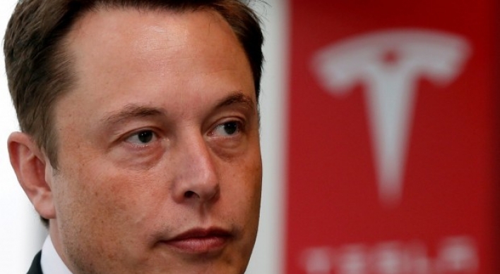 Tesla shares surge in premarket trading