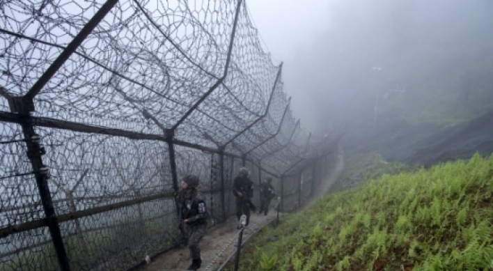 Koreas begin destroying 20 front-line guard posts