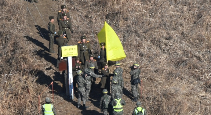 In a first for the two Koreas, inspectors verify removal of front-line guard posts