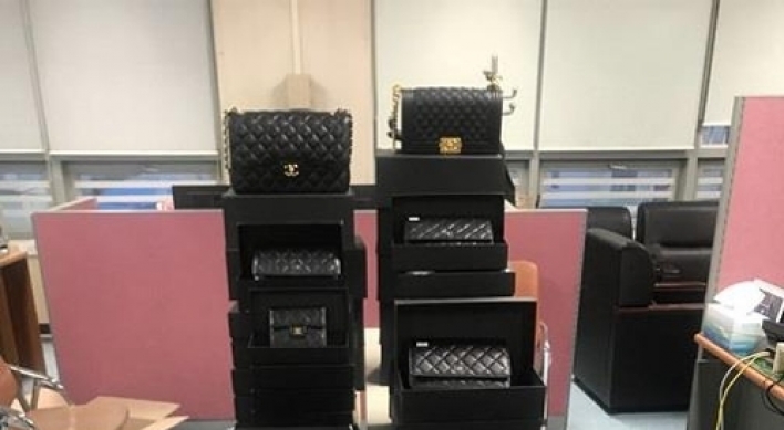 Japanese, Korean arrested for importing fake Chanel bags from Italy