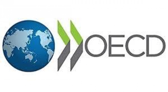 OECD lowers economic forecast amid slowing growth