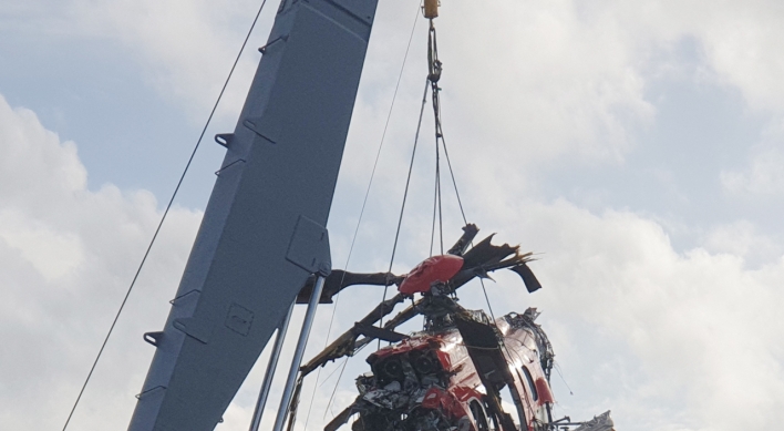 One more body retreived at East Sea chopper crash site