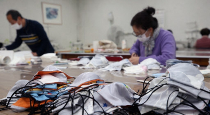S. Korea curbs exports of facial masks amid soaring virus cases