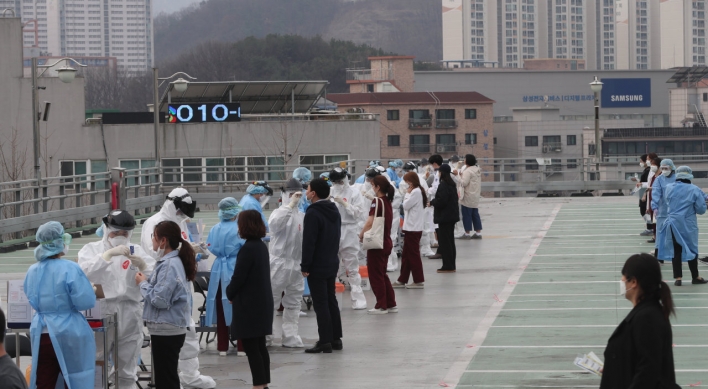 S. Korea’s virus tally tops 10,000, 74 days after first case reported