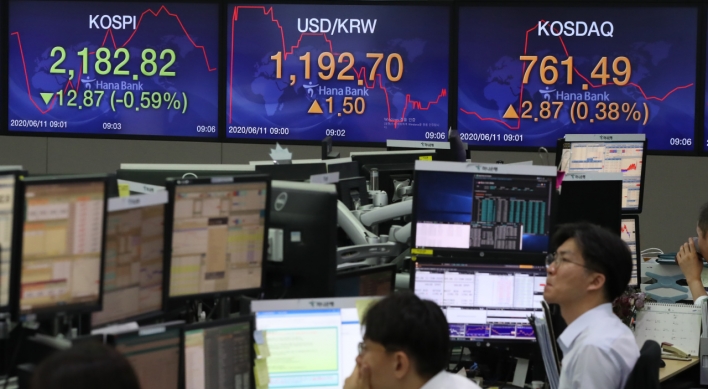 Seoul stocks open lower on Fed's gloomy forecast
