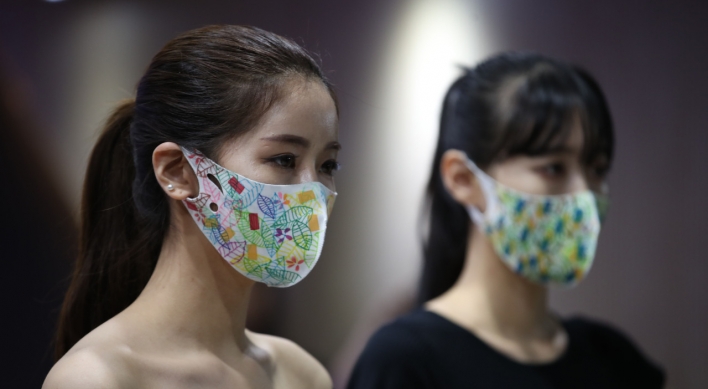 Colorful face masks gain popularity in Korea