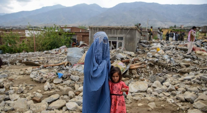 Search for bodies as Afghan floods kill more than 160