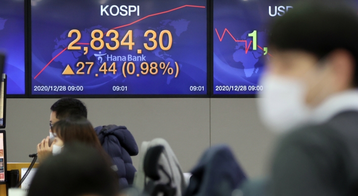 Seoul stocks open higher on chip gains