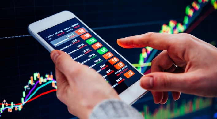 Daily mobile stock trading volume surges 220% in 2020