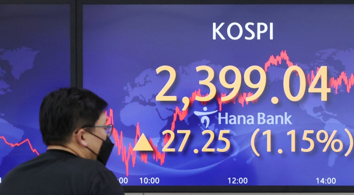 Seoul shares up over 1% on hopes of eased tightening, Samsung gains