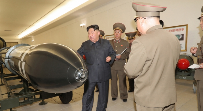 Kim Jong-un reveals nuclear warhead, calls for more weapons-grade material