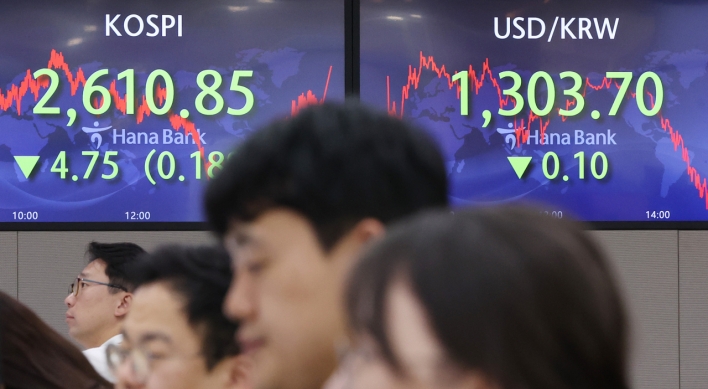 Seoul shares end lower amid rate hike woes