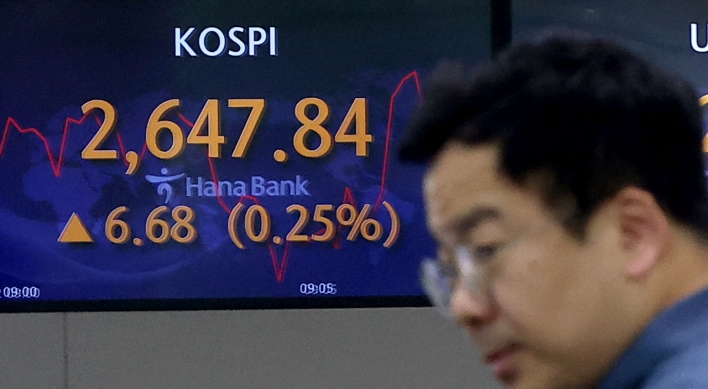 Seoul shares open tad higher ahead of Fed meeting