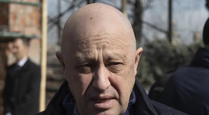 The mercenary chief who urged an uprising against Russia's generals has long ties to Putin