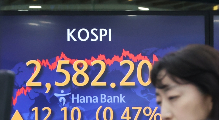 Seoul shares end higher on tech, auto gains