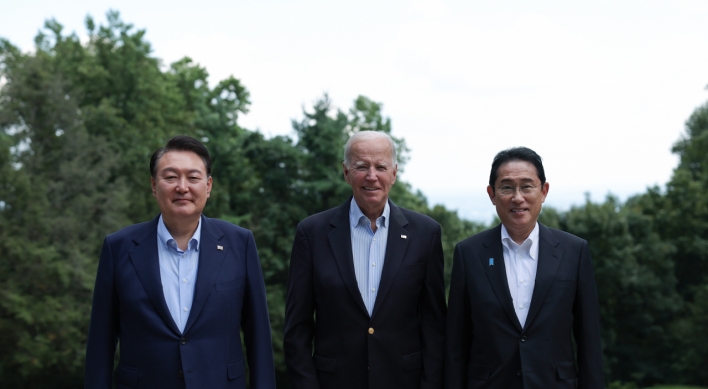 Yoon returns home from Camp David summit with Biden, Kishida