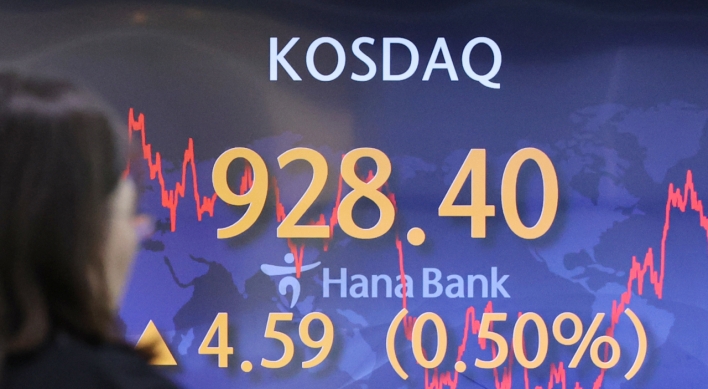 Seoul shares open nearly flat amid rate pause prospects