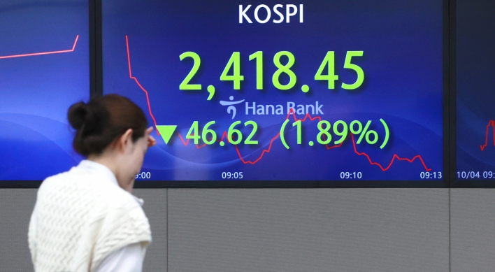 Seoul shares open higher on Fed rate pause hopes