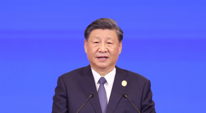 China's Xi promises more market openness and new investments