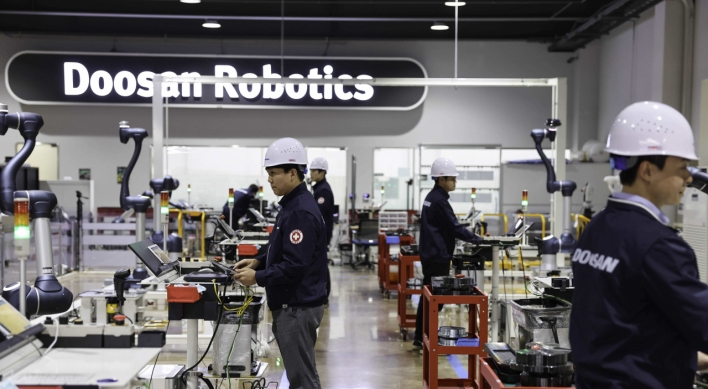 [From the Scene] Doosan to double output of 'cobots' with advanced but cheaper sensors by 2024