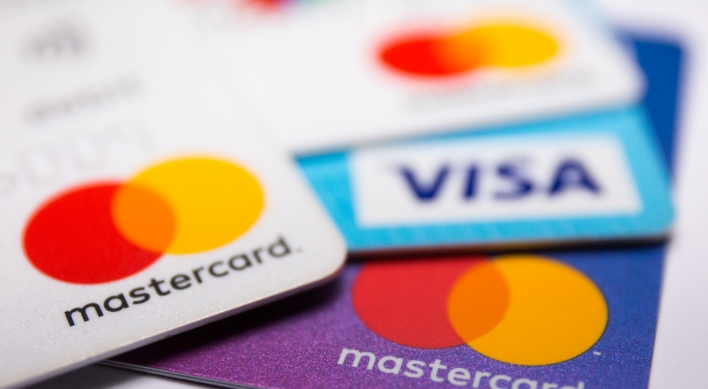 Woori, BC improve profits in overseas card business