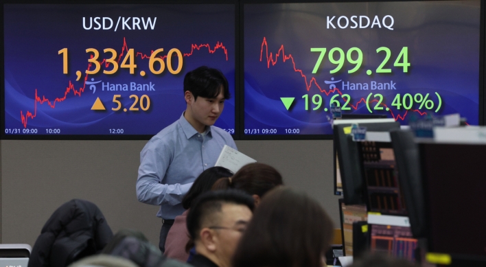 Seoul shares fall as chipmakers weighed down after Samsung Electronics earnings