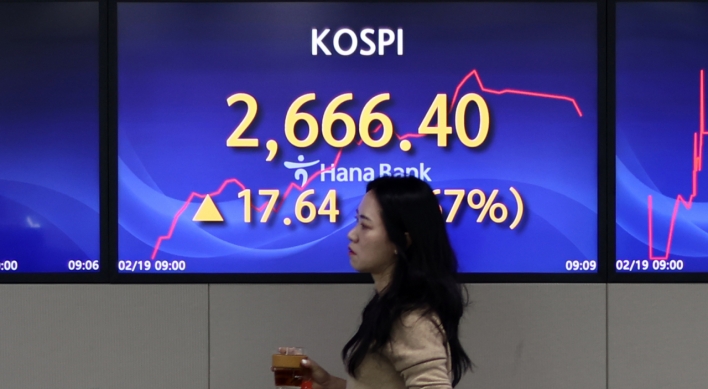 Seoul shares open higher on tech, auto gains