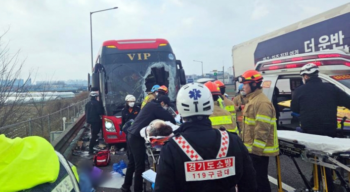 Wheel falls off truck and hits bus; 2 killed, 12 injured